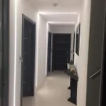 Sr